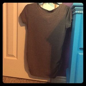 Sleeveless, tan shirt